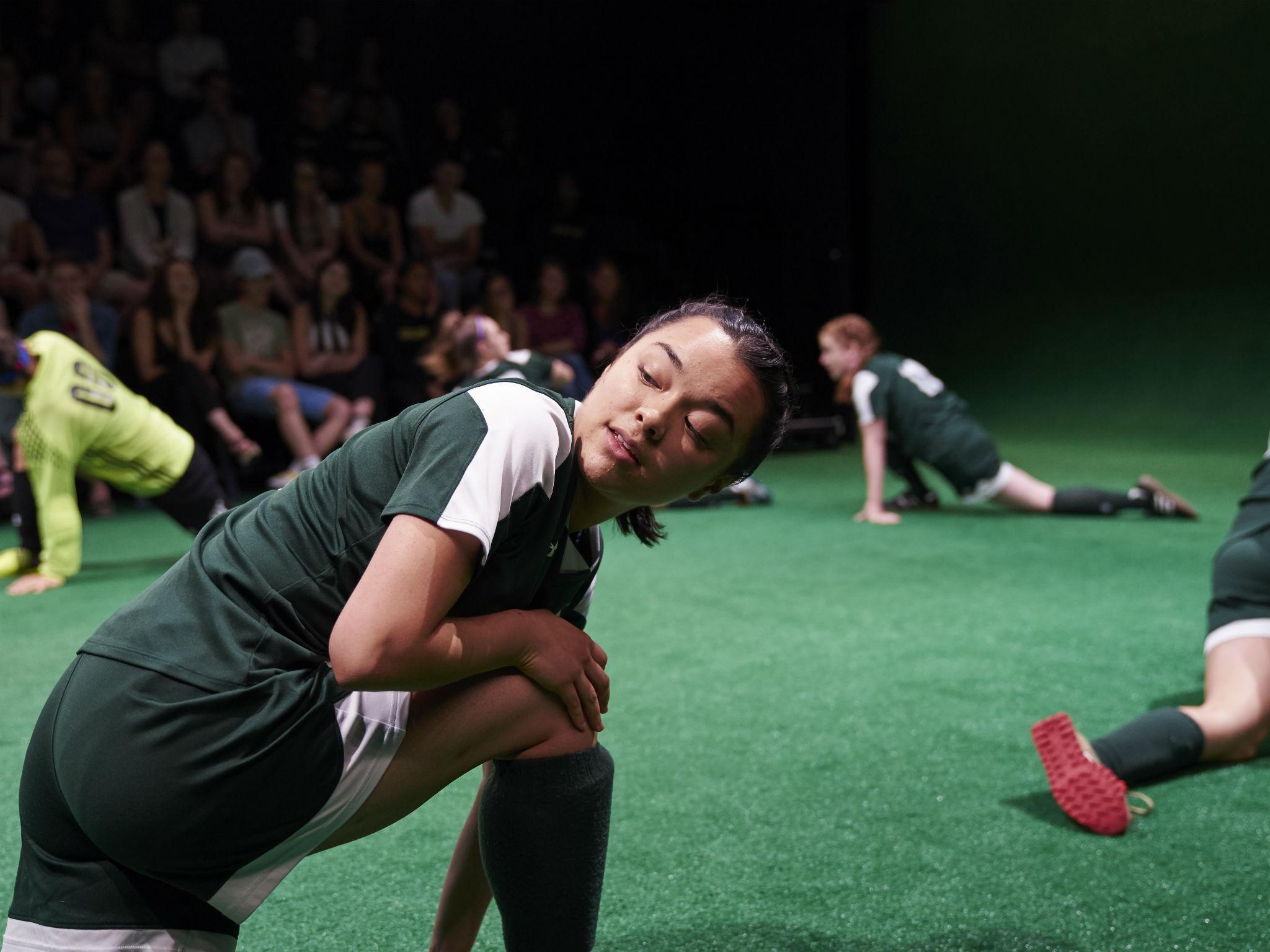 Nine girls on the football pitch, testing themselves and creating their identities