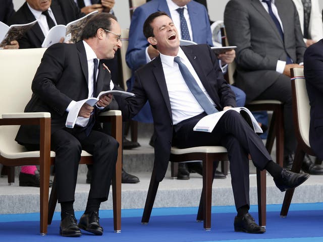 Prime Minister Manuel Valls (right) is running after President Hollande (left) announced he will not seek re-election