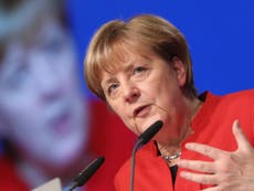 Angela Merkel re-elected as leader of CDU