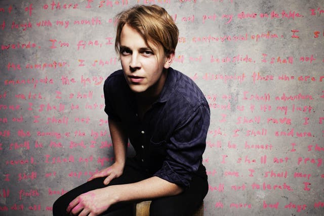 Tom Odell was first signed to Lily Allen's In The Name Of record label that has now folded