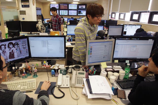 Researchers investigating computer viruses at an IT security company in Seoul, South Korea after a cyber attack