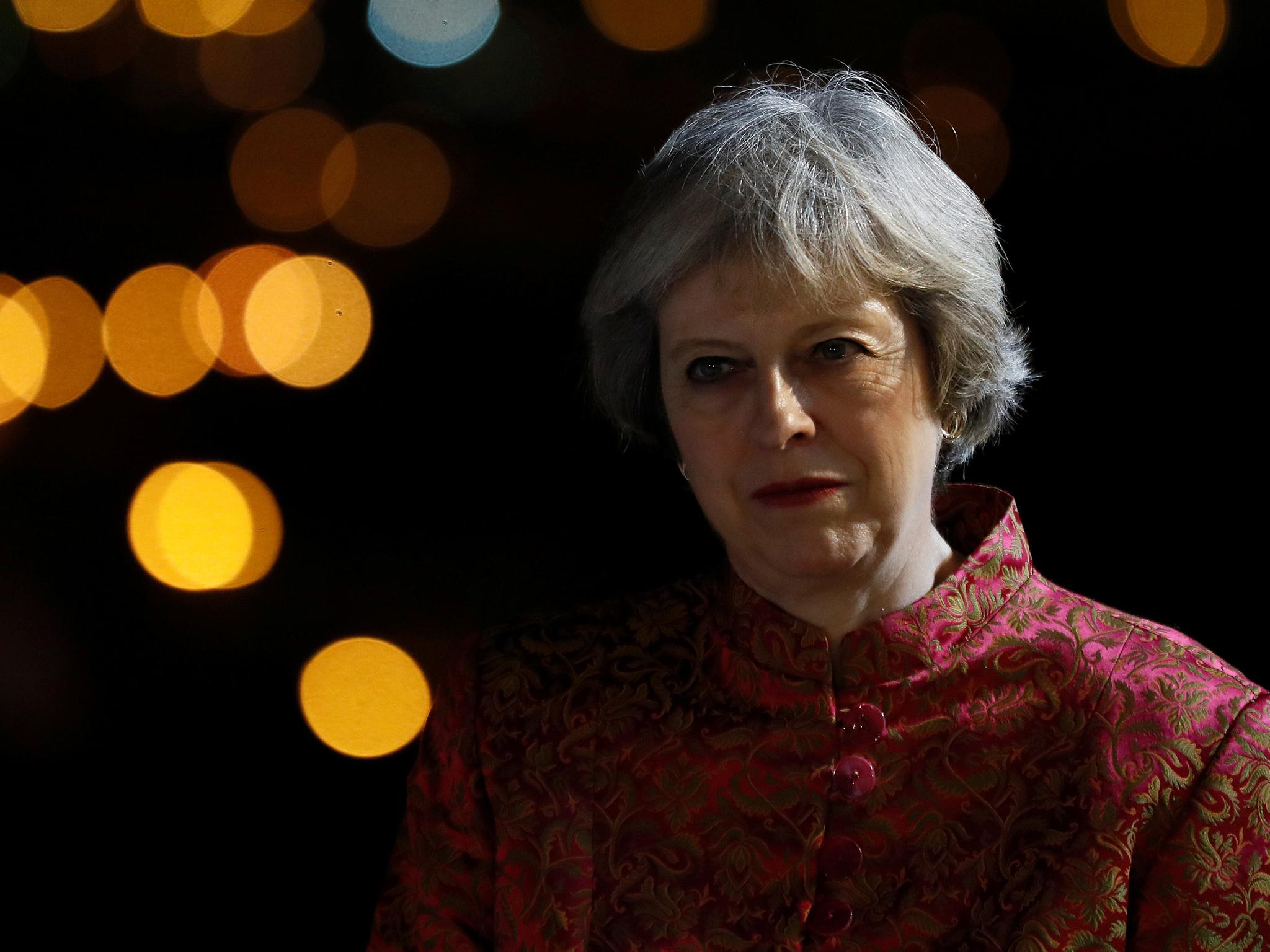 Theresa May attends a reception in Bahrain