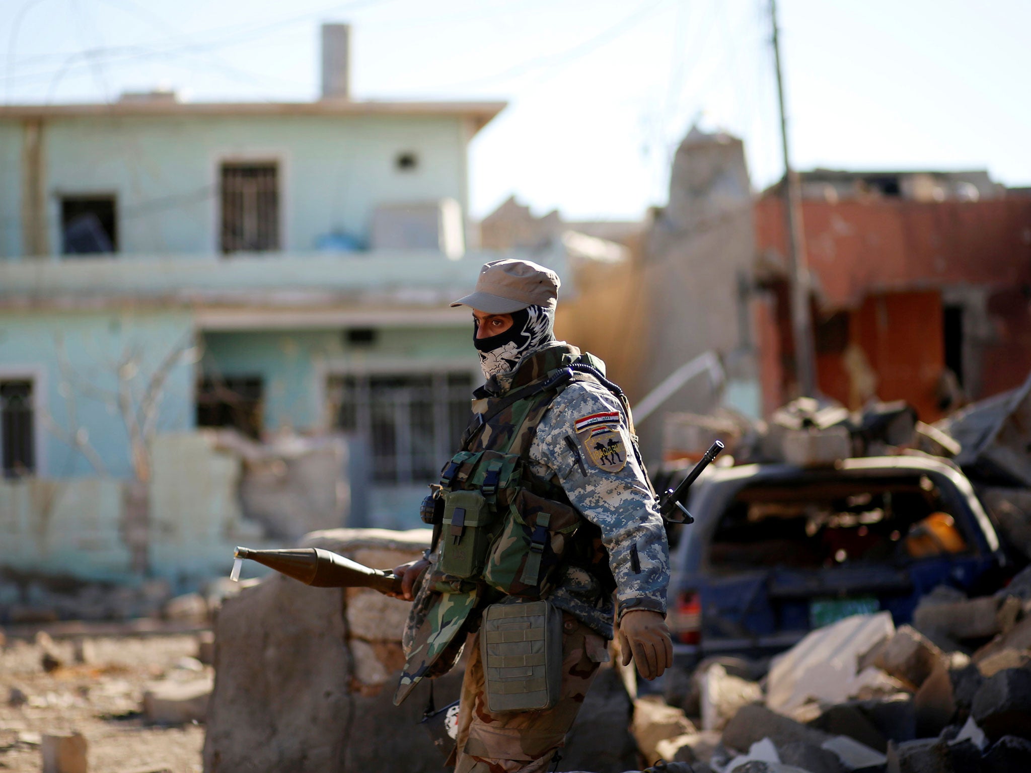 A member of the Iraqi security forces battling Isis near Mosul