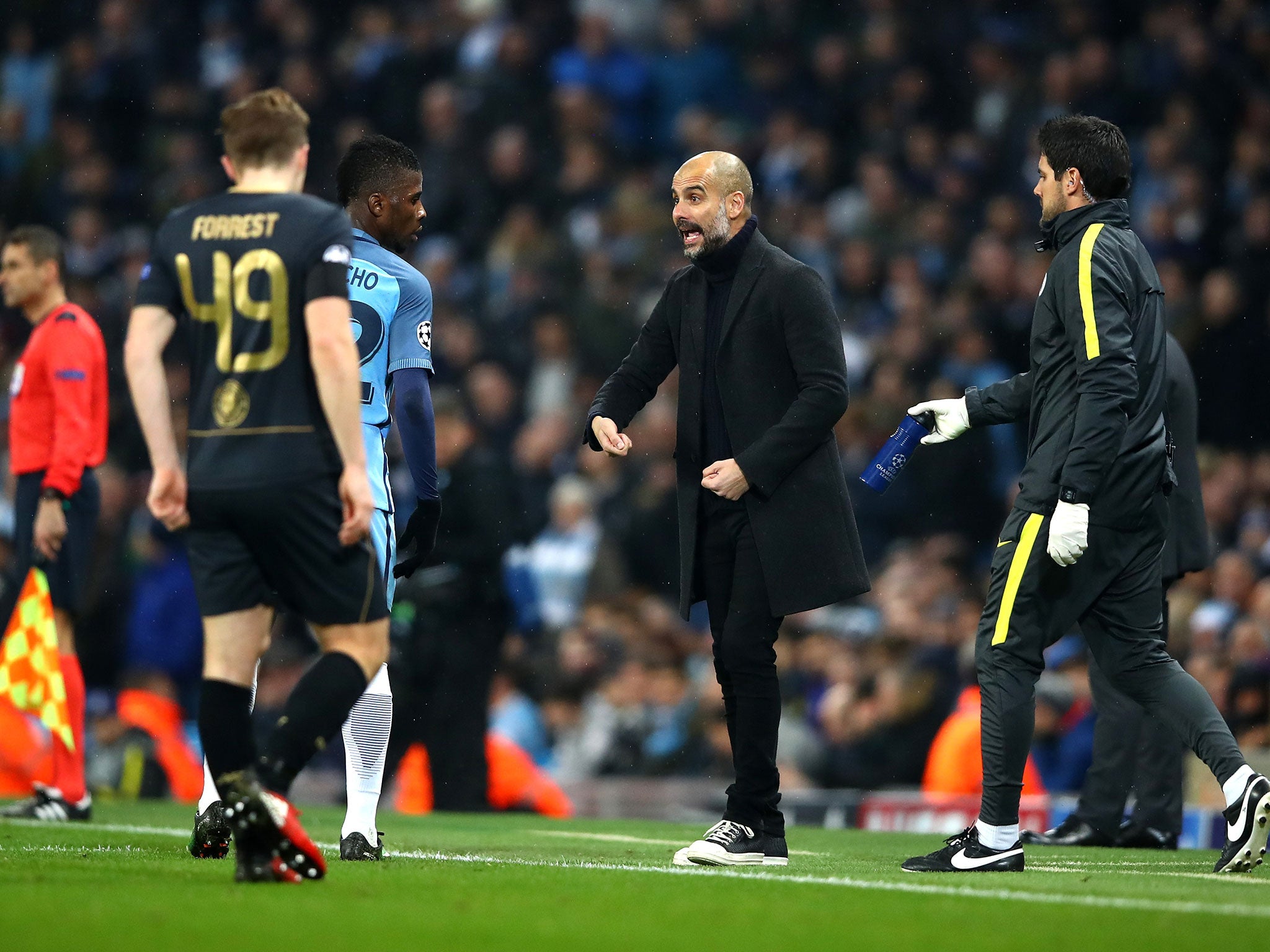 Pep Guardiola issues orders from the sideline