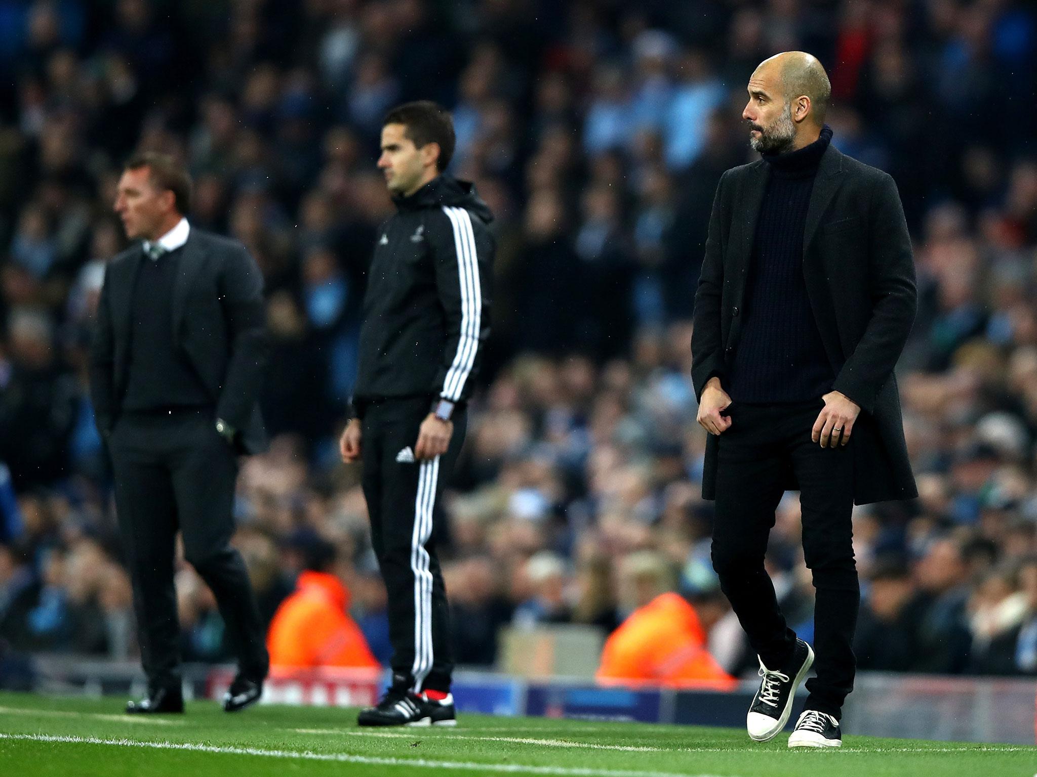 Pep Guardiola looks on from the sideline during Tuesday night's match