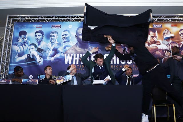 An outraged Chisora threw a table at Whyte during Wednesday's press conference