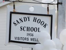 Woman arrested for 'threatening' father of child killed at Sandy Hook
