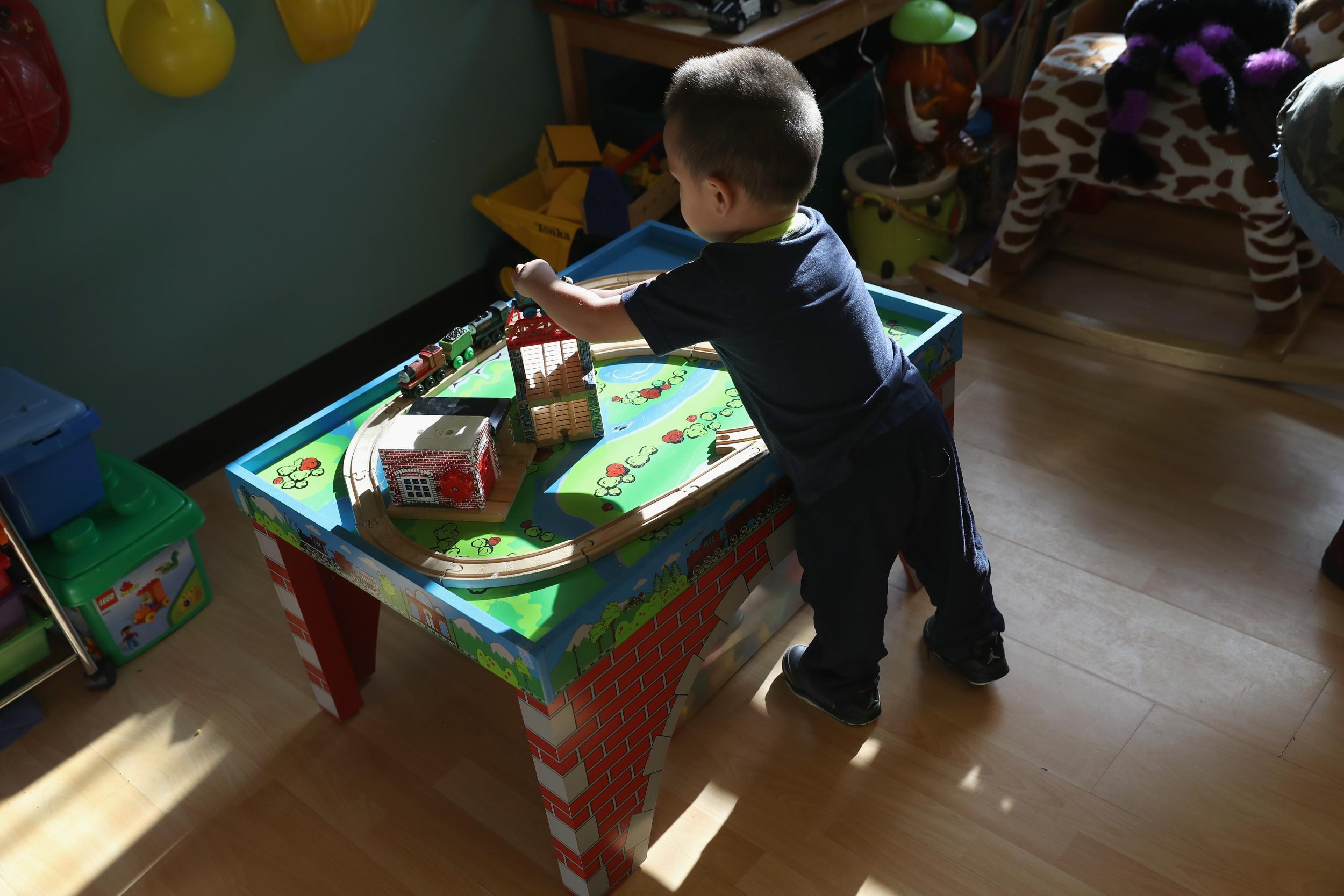 A young child plays in an English learning centre in Connecticut