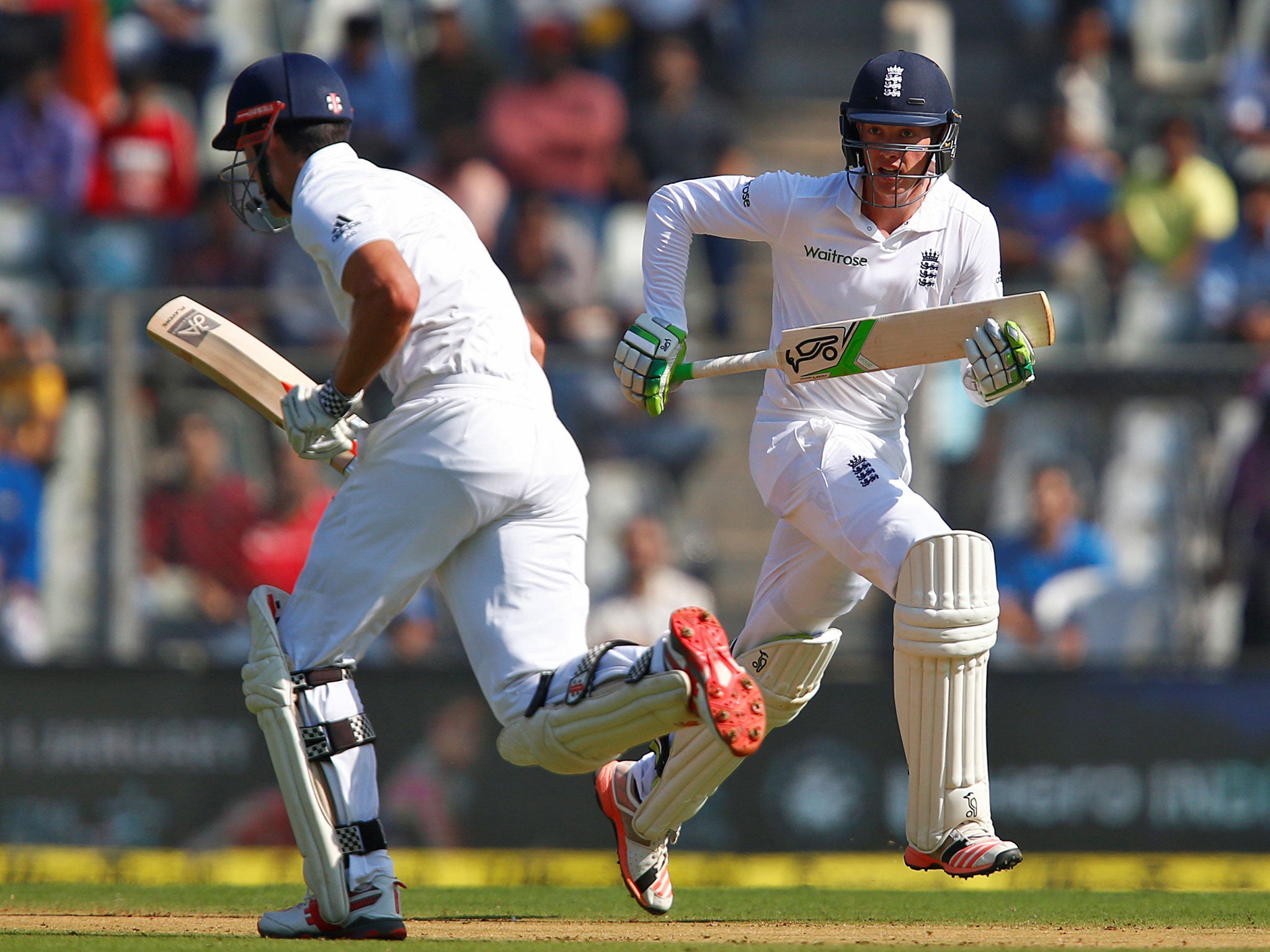 Jennings (R) and Alastair Cook run between wickets