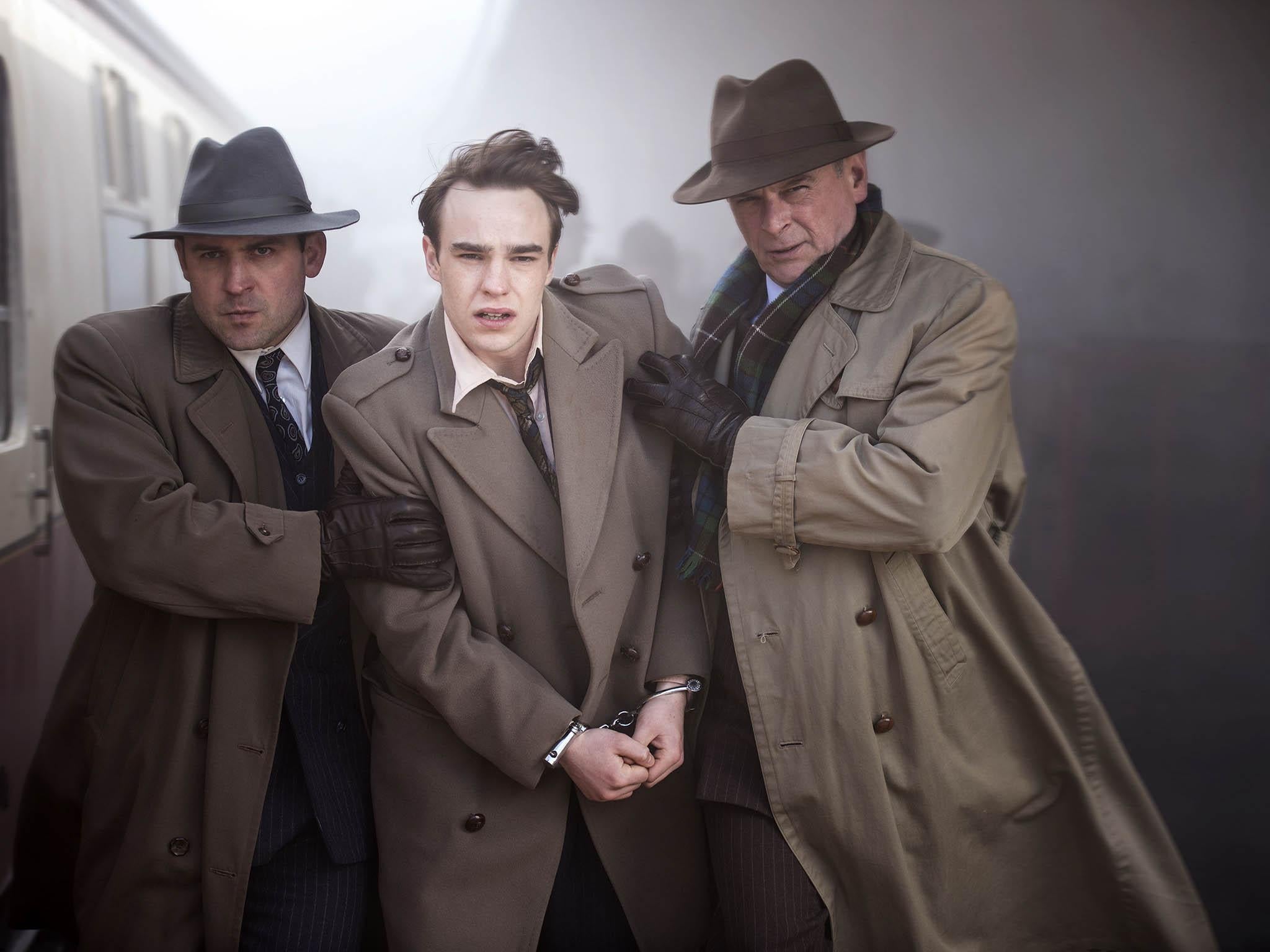 In ‘Rillington Place’, Nico Mirallegro (centre) plays Timothy Evans, who was hanged for the murder of his daughter, a crime in fact committed by John Christie