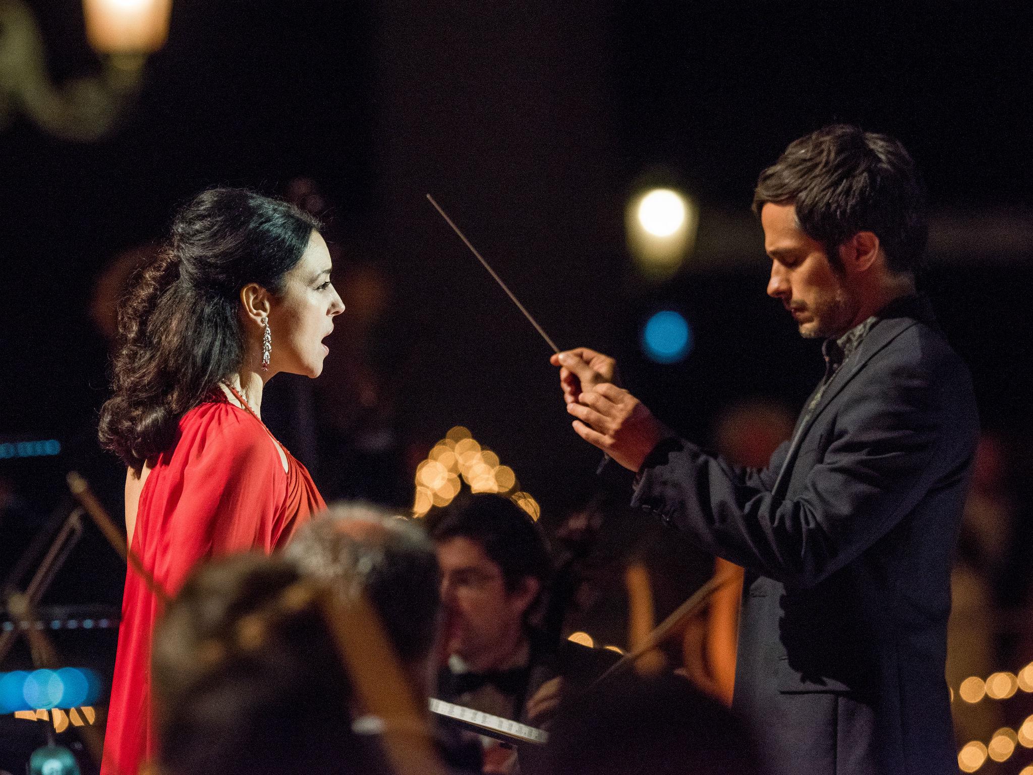 Monica Belluci as opera diva Alessandra, with the orchestra’s energetic new South American conductor, Rodrigo De Souza, played by Gael Garcia Bernal