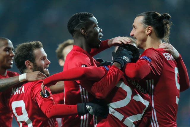 Manchester United celebrate after their first goal during the Europa League group A match between Manchester United and Zorya Luhansk in Odessa, Ukraine, on 8 December