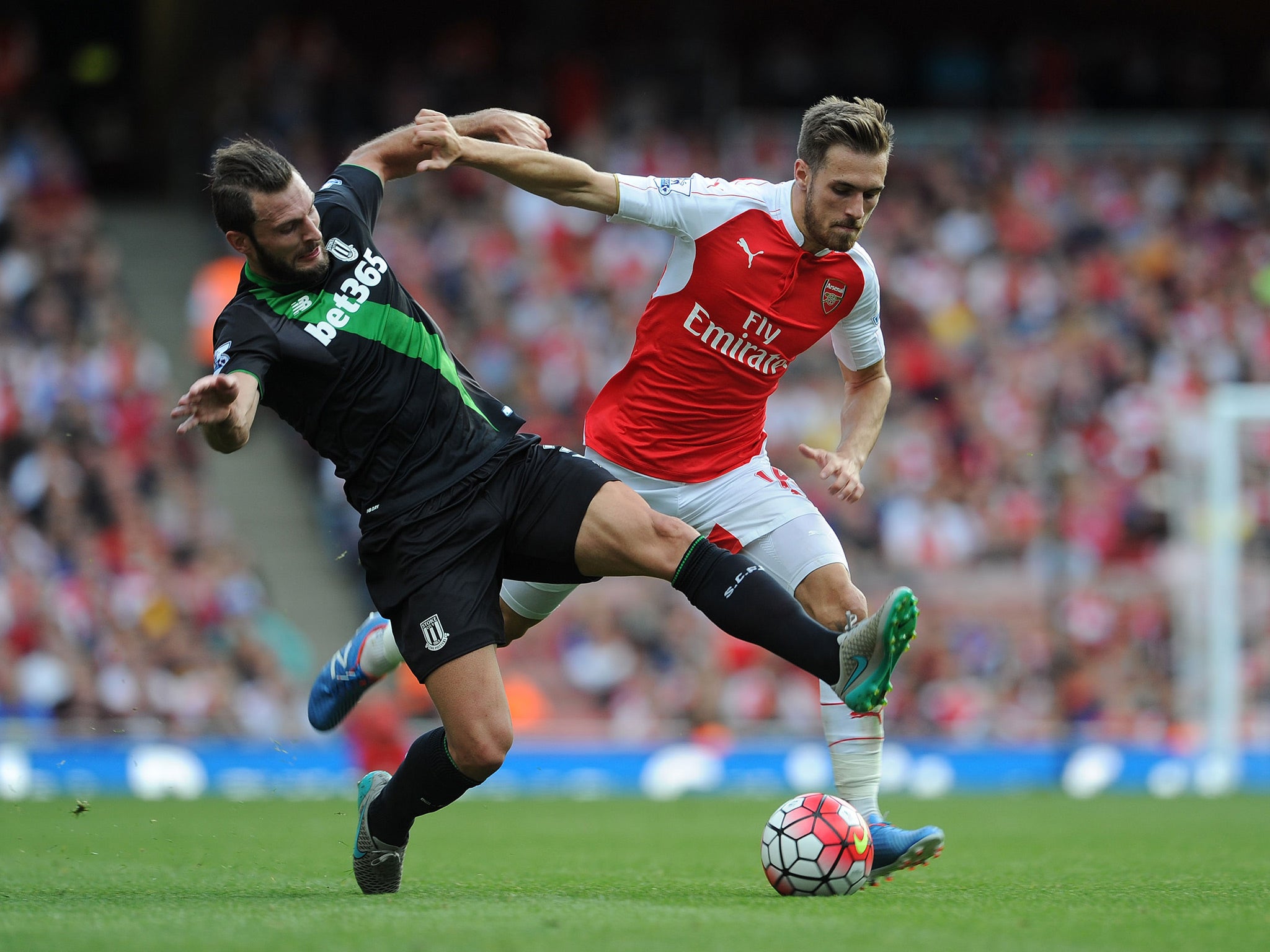 Pieters competes for the ball with Ramsey during last season's corresponding fixture