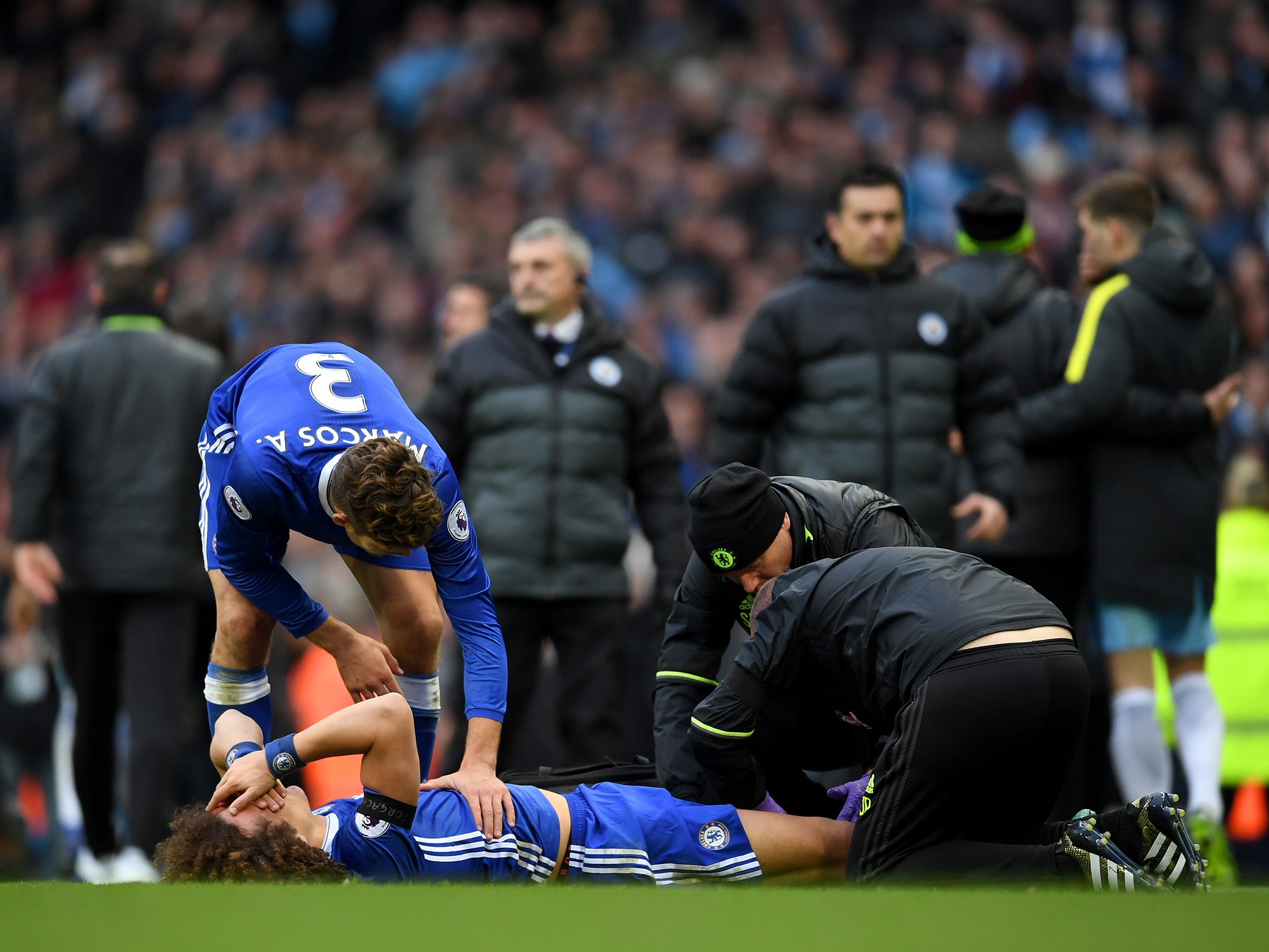 Luiz was left writhing in pain after the reckless challenge by Aguero