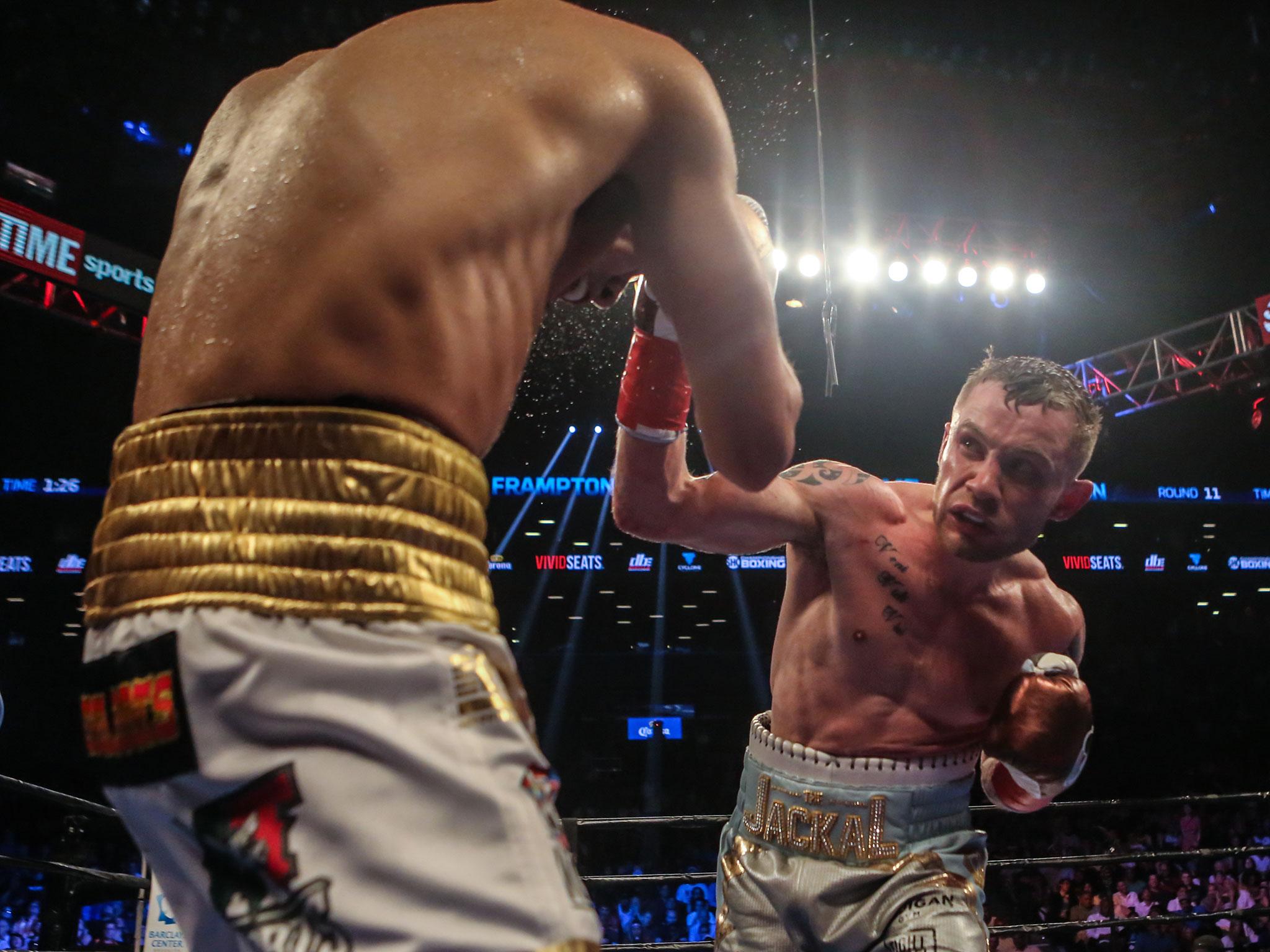 Carl Frampton fighting Leo Santa Cruz earlier this year; Frampton was one of the first to pay tribute to Alejandro Gonzalez Jr. after his death