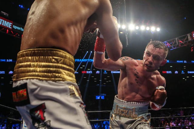 Carl Frampton fighting Leo Santa Cruz earlier this year; Frampton was one of the first to pay tribute to Alejandro Gonzalez Jr. after his death