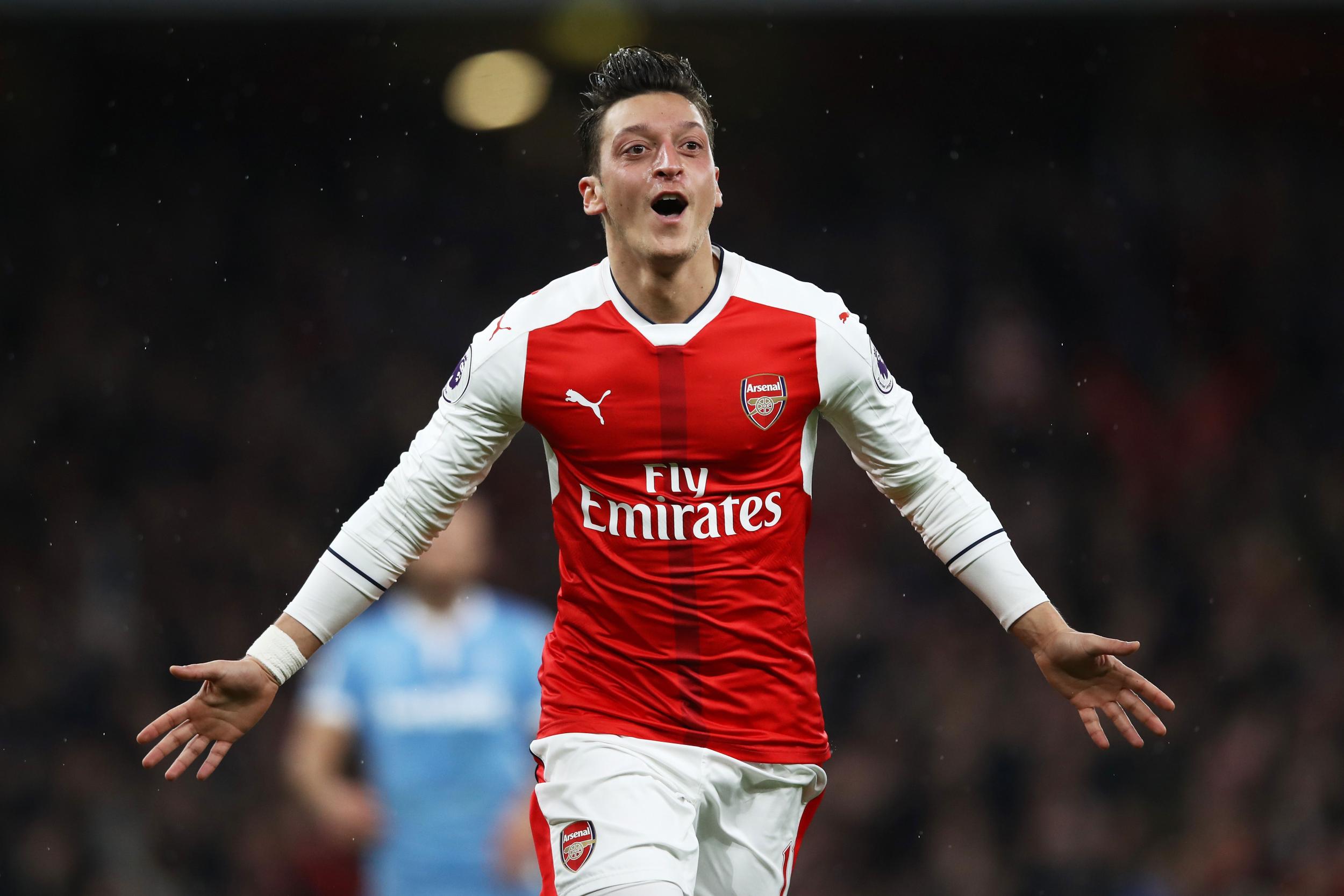 Mesut Ozil gives Arsenal the lead with a looping header