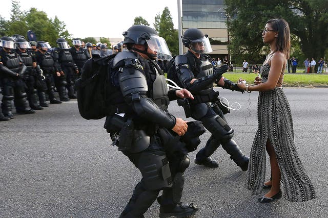 . Iesha Evans, the young woman who at the Baton Rouge protests last summer stood serenely as two heavily armed policemen in riot gear rushed at her, proves that that spirit of defiance is still alive today