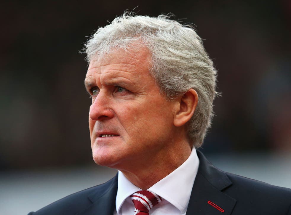 Mark Hughes was in no mood to answer questions about abusive Stoke chants directed at Aaron Ramsey