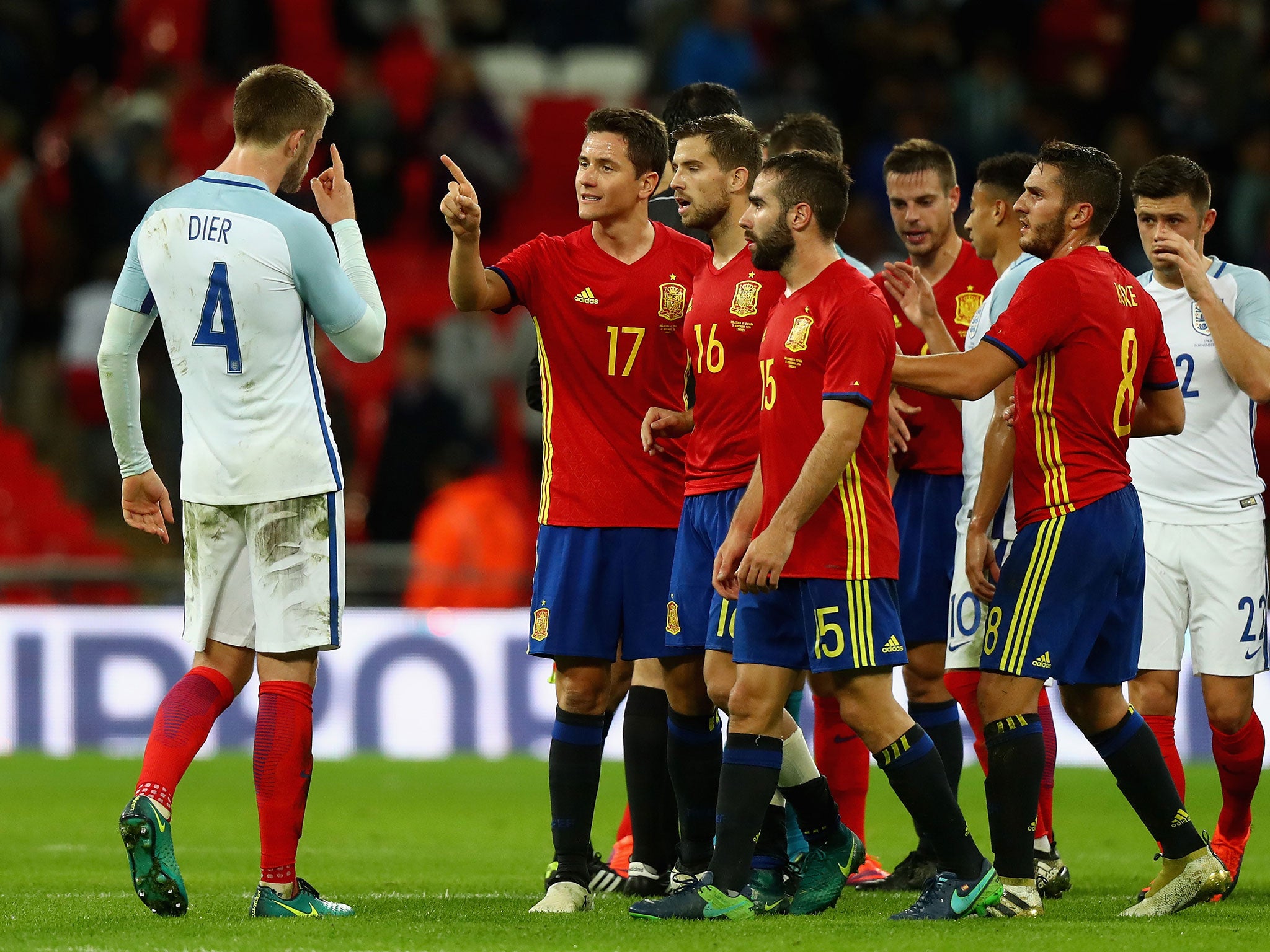 Dier and Herrera square up to one another during last month's international friendly between England and Spain