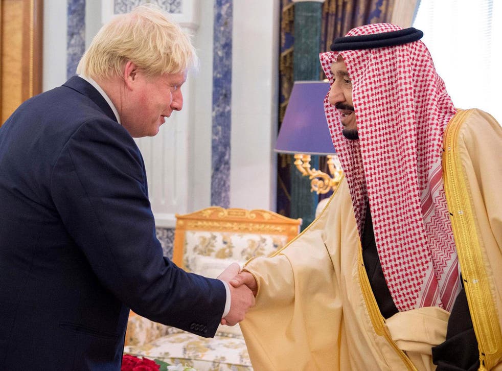 British Foreign Secretary Boris Johnson shakes hands with Saudi King Salman Bin Abdulaziz Al-Saud in Riyadh, Saudi Arabia, 11 December, 2016
