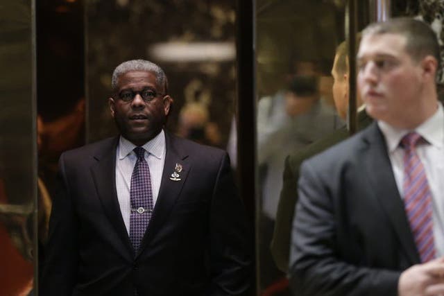 Former US Representative Allen West stands in an elevator as he arrives at Trump Tower in New York City