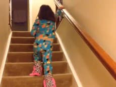 Father's video of cancer-suffering daughter heroically climbing stairs