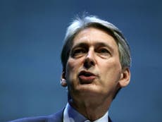 No UK trade deal with US until EU obligations end, Hammond admits