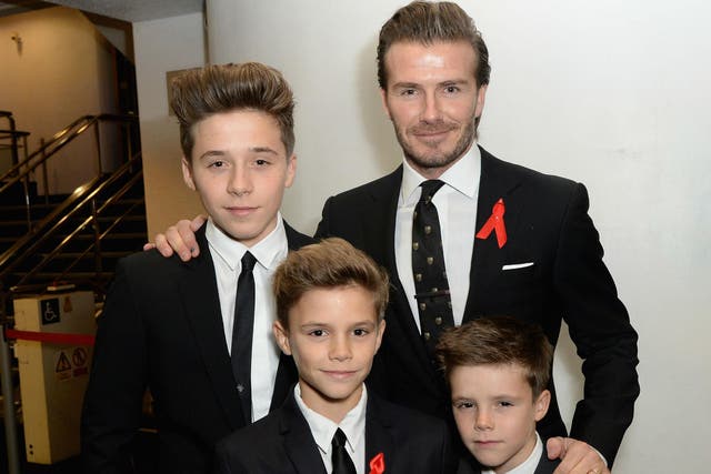 David Beckham with his sons Brooklyn, Romeo and Cruz (from right to left) in 2013