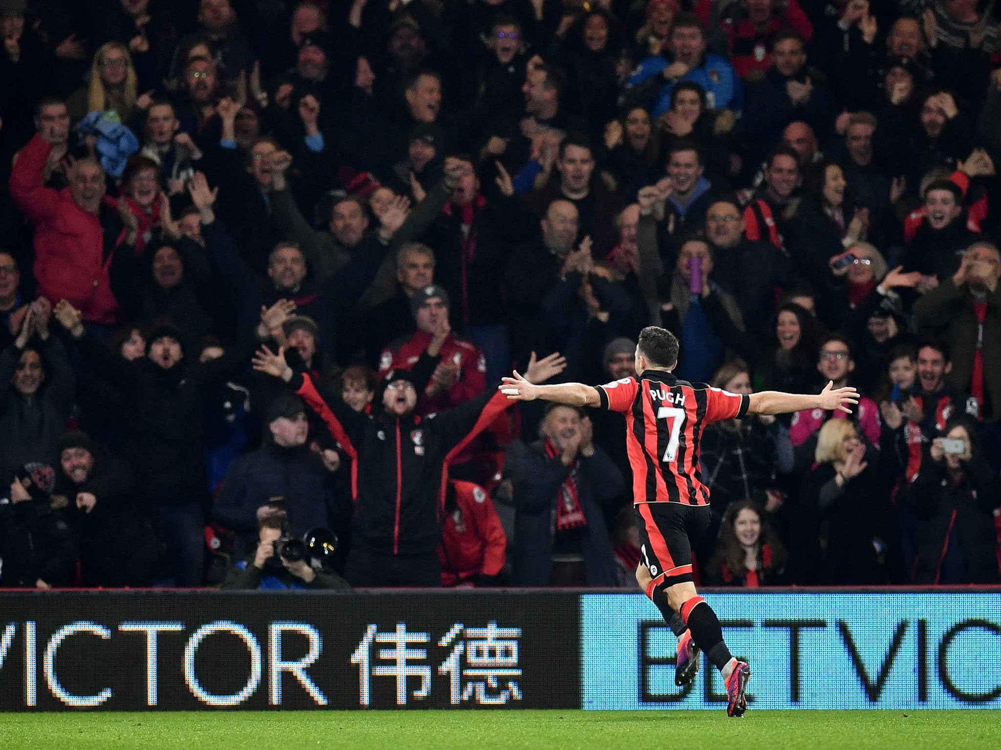 Marc Pugh celebrates his goal in front of the Bournemouth faithful