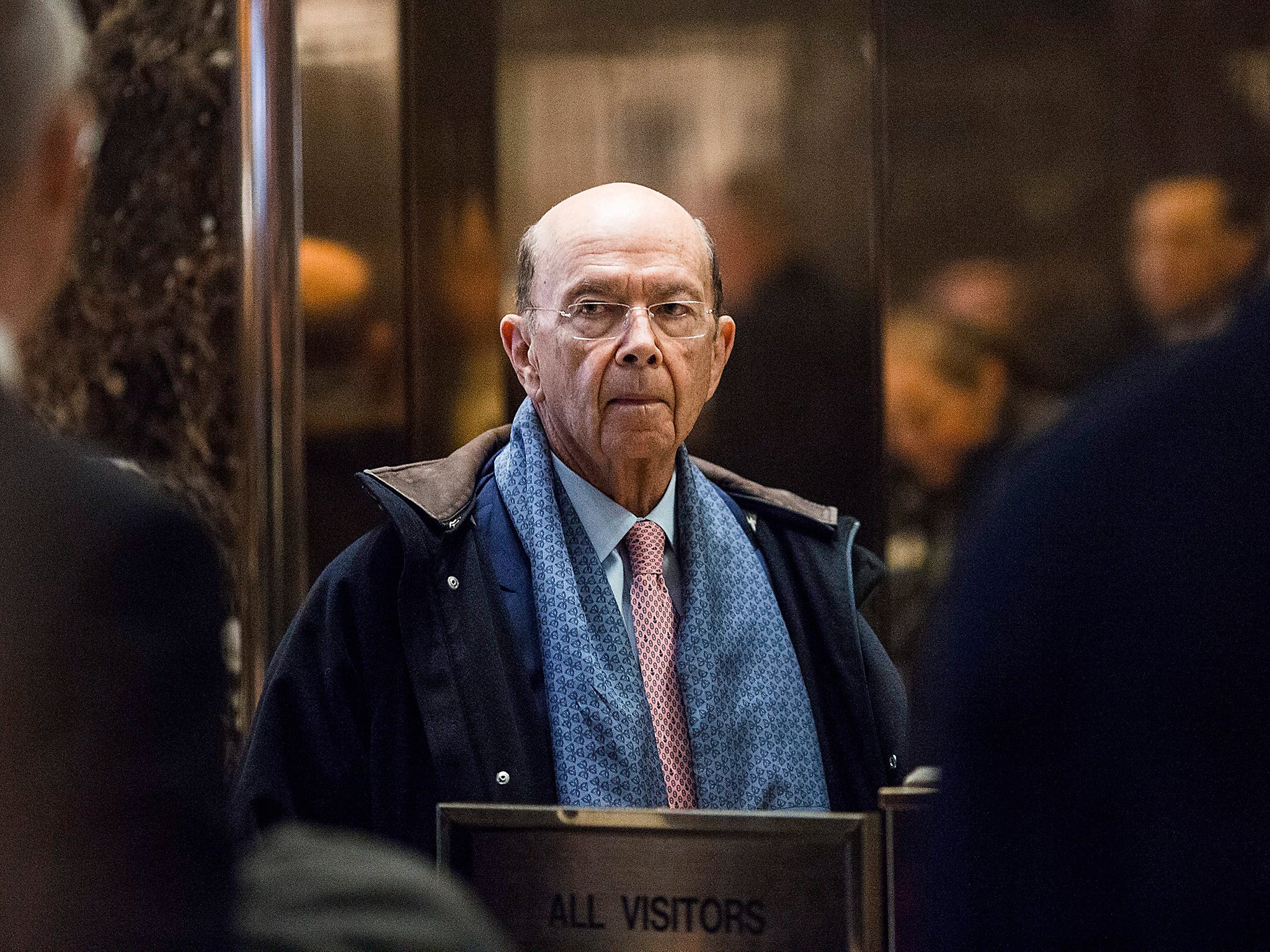 Billionaire investor Wilbur Ross arrives in the lobby of Trump Tower in Manhattan, New York. The US President-elect Donald Trump is holding meetings at Trump Tower as he continues to fill in key positions in his new administration