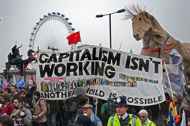 Half a million protesters join an anti-cuts 'March for the Alternative' rally organised by the TUC (Rex)