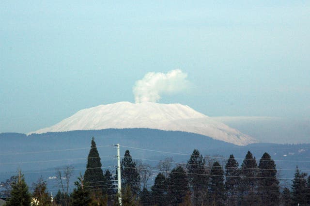 A cloud of condensation erupts from the volcano in 2006