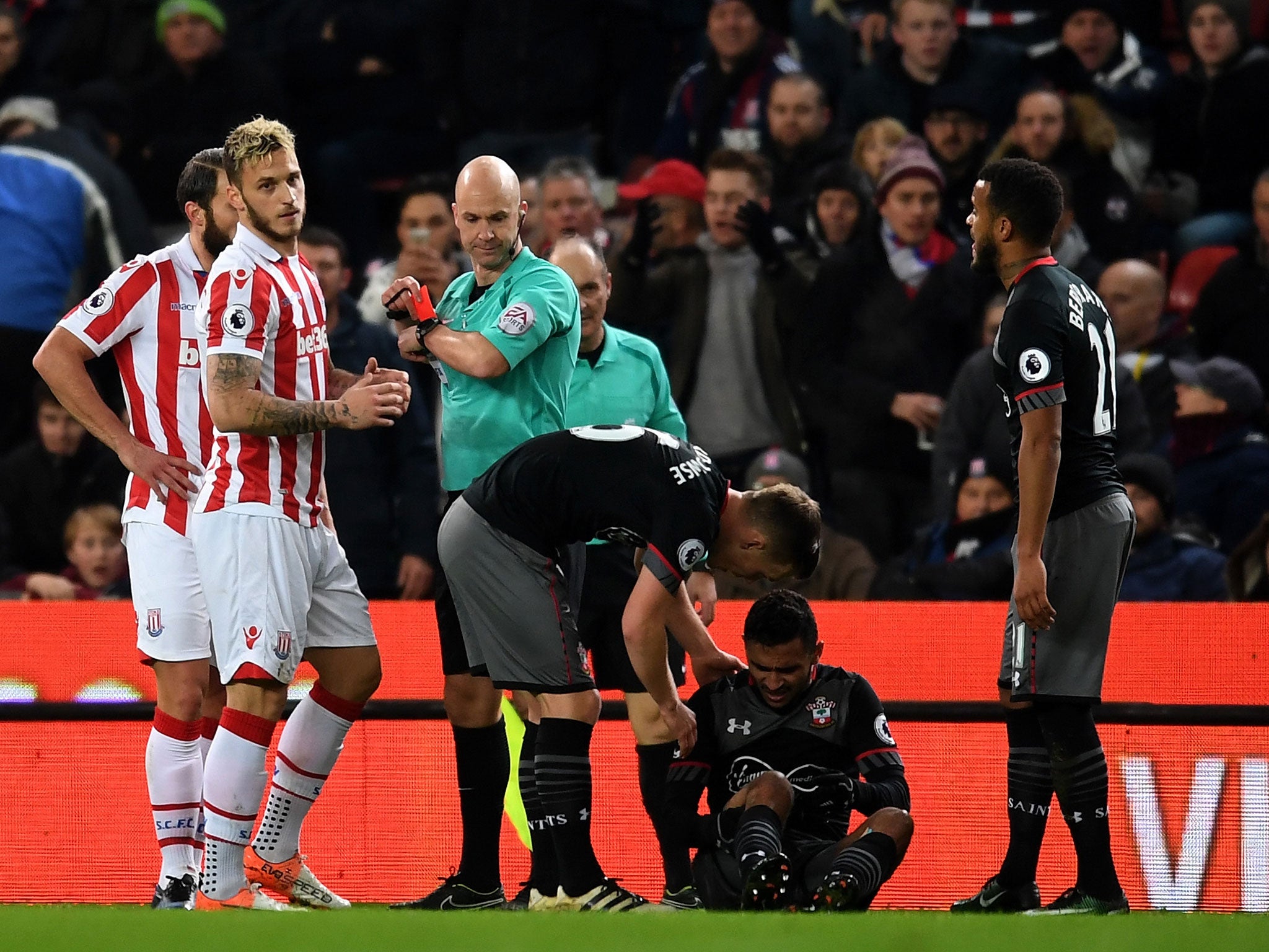 Marko Arnautovic is shown red for a dangerous challenge early on in the game