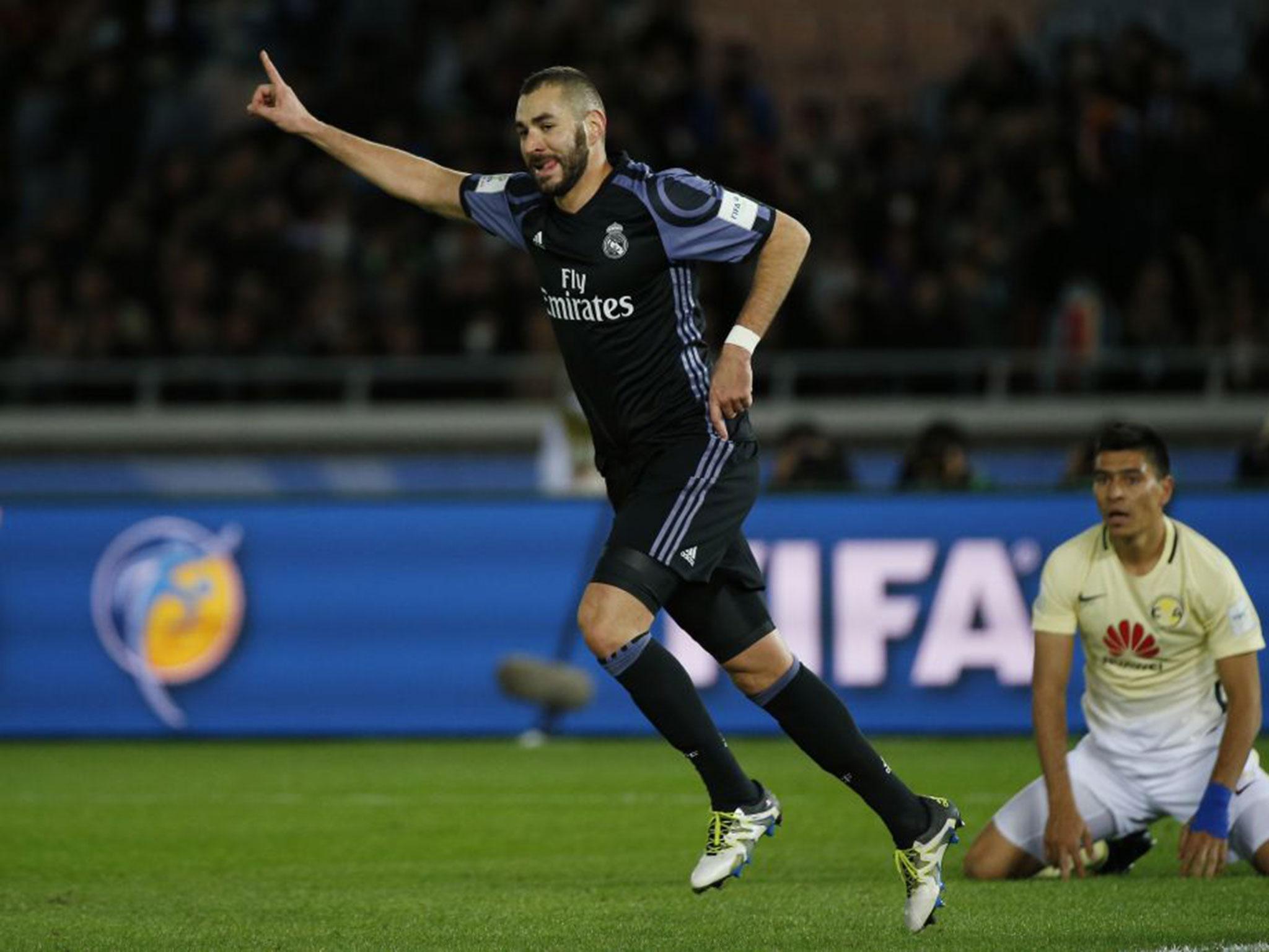 Karim Benzema celebrates putting Real Madrid ahead against Club America