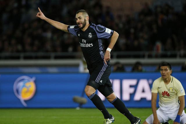 Karim Benzema celebrates putting Real Madrid ahead against Club America