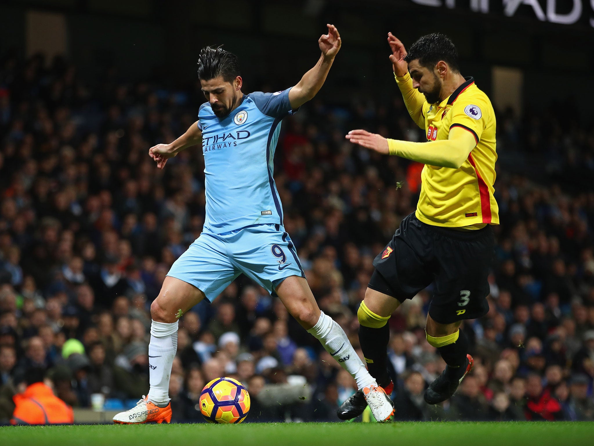 Nolito vies for the ball against Watford's Miguel Britos during Wednesday night's Premier League game
