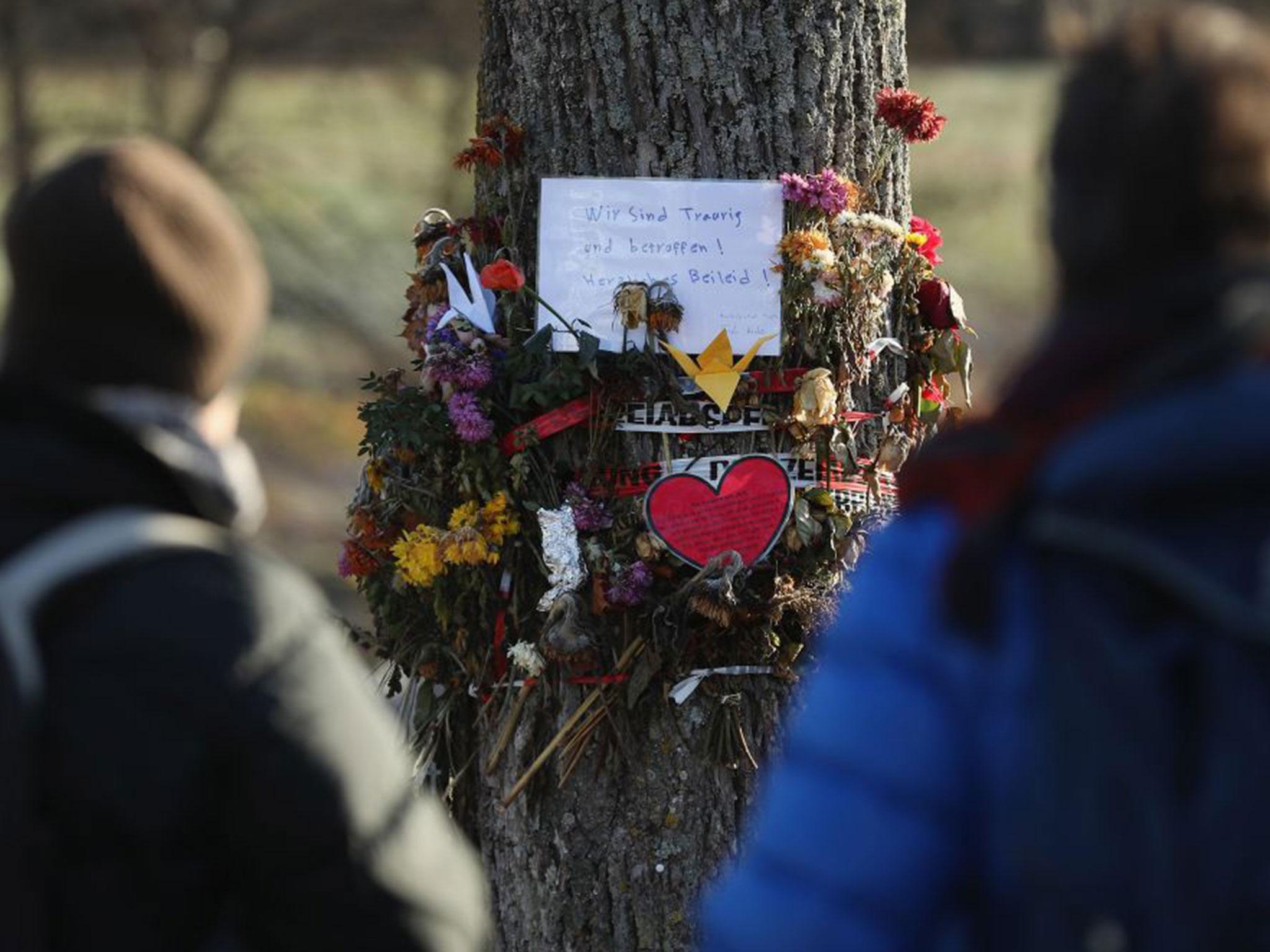 Flowers and messages left where a 19-year-old medical student was raped and murdered on 8 December in Freiburg, Germany
