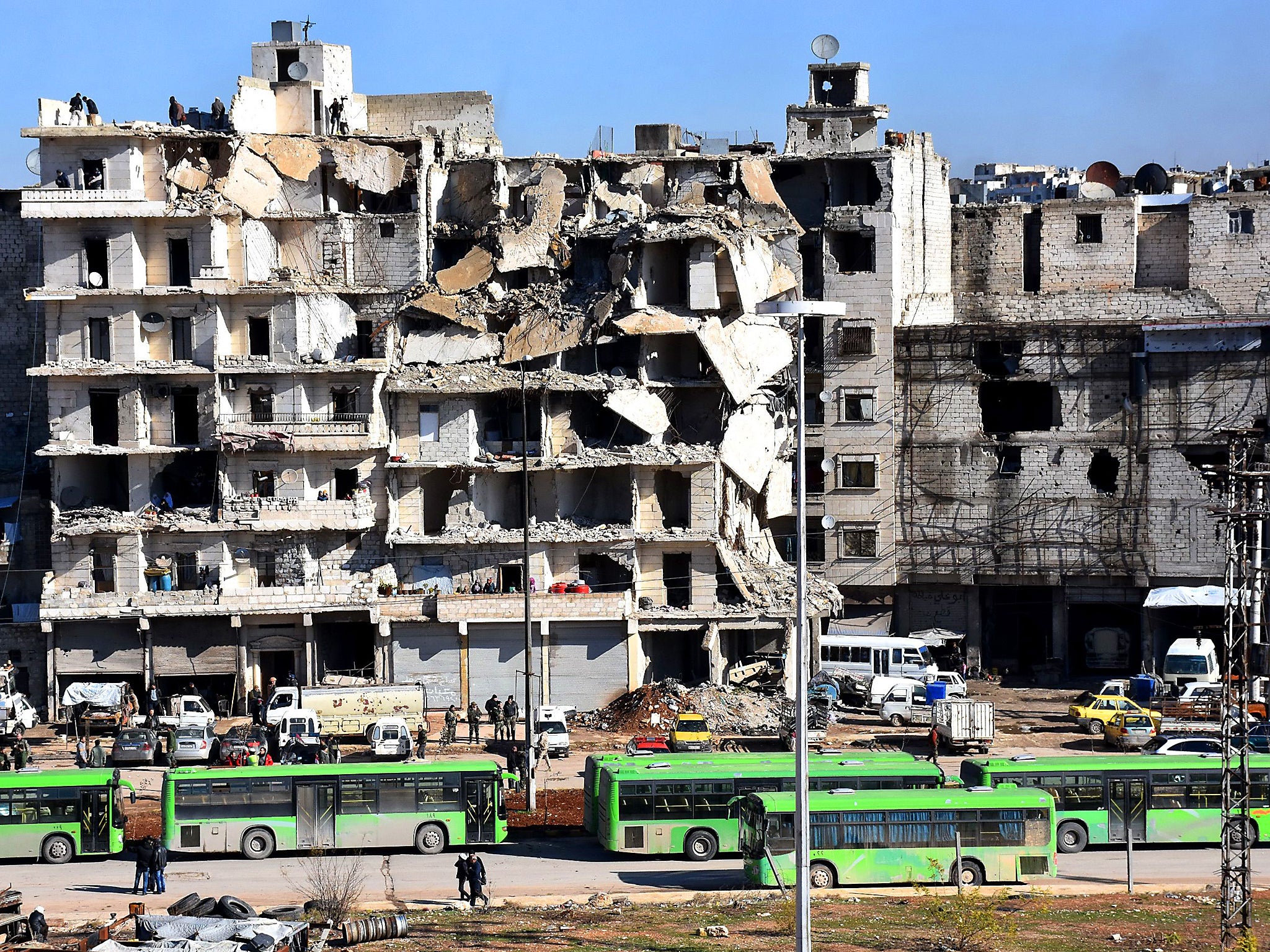 A block of flats destroyed by the ongoing battle in Aleppo