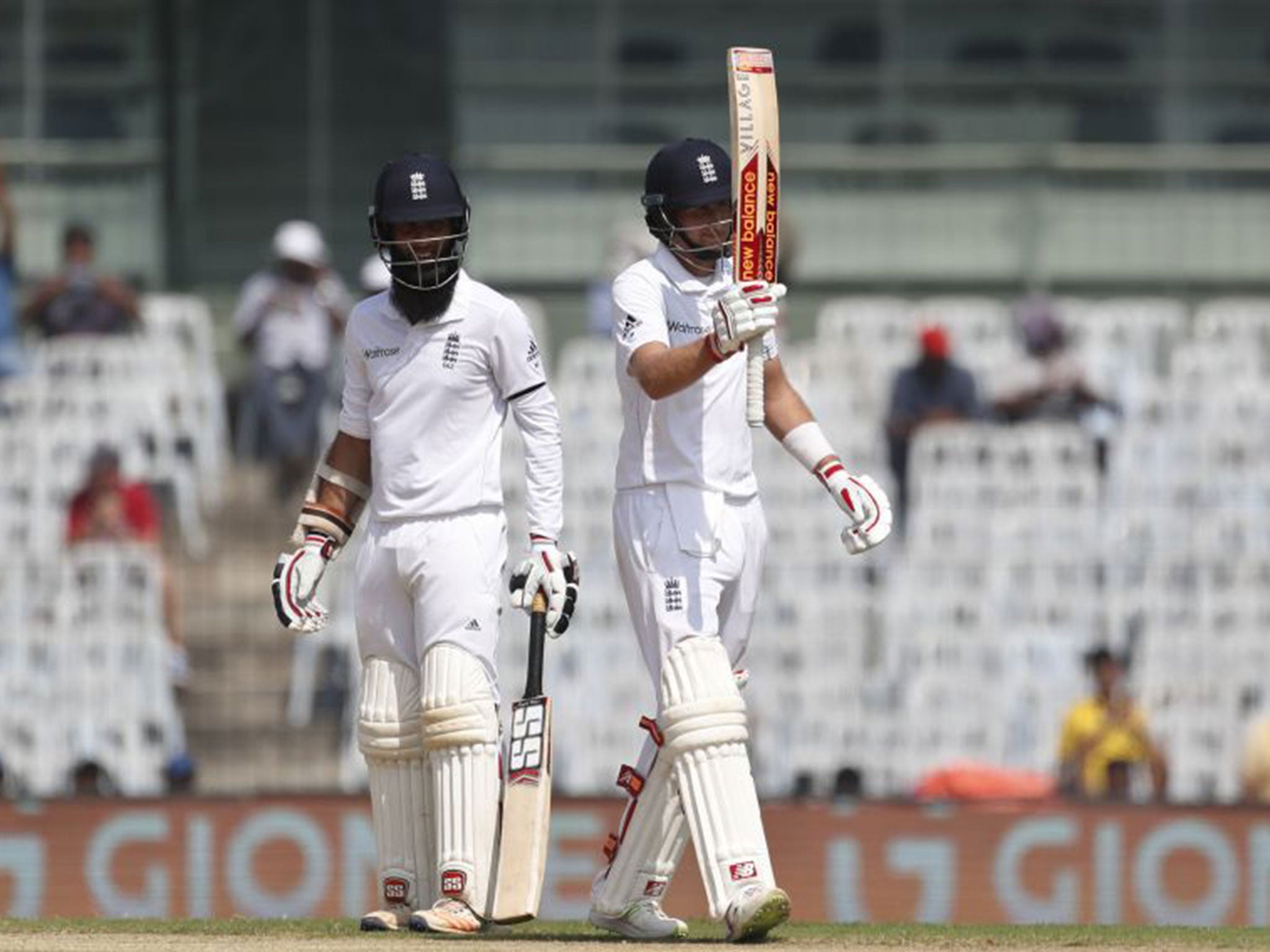 Joe Root celebrates reaching his half century on the first day of the fifth Test