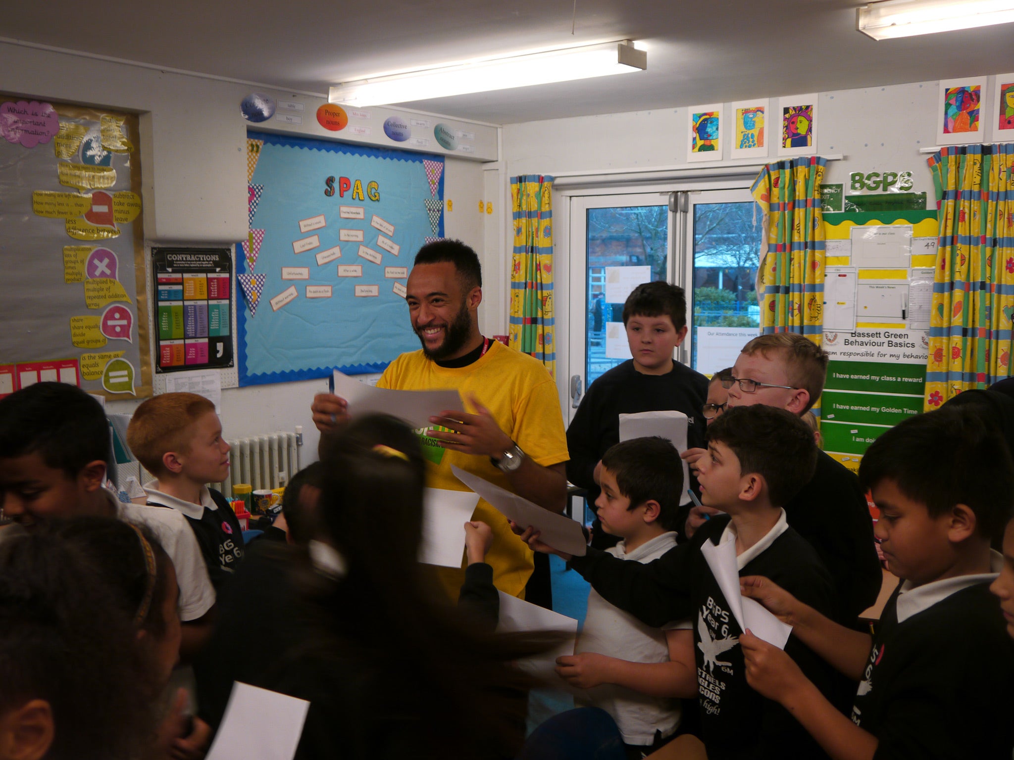 Redmond taking a 'Kick It Out' anti-racism session at Bassett Green Primary School in Southampton