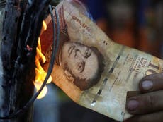 Looting and protests on streets as Venezuelans fume over cash chaos