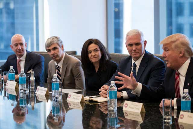 Mike Pence listens as Donald Trump addresses tech chiefs in New York last month. From left: Amazon’s Jeff Bezos, Google parent Alphabet’s Larry Page and Facebook’s Sheryl Sandberg