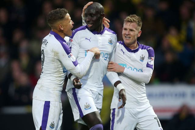 Mohamed Diame celebrates scoring the winning goal for Newcastle