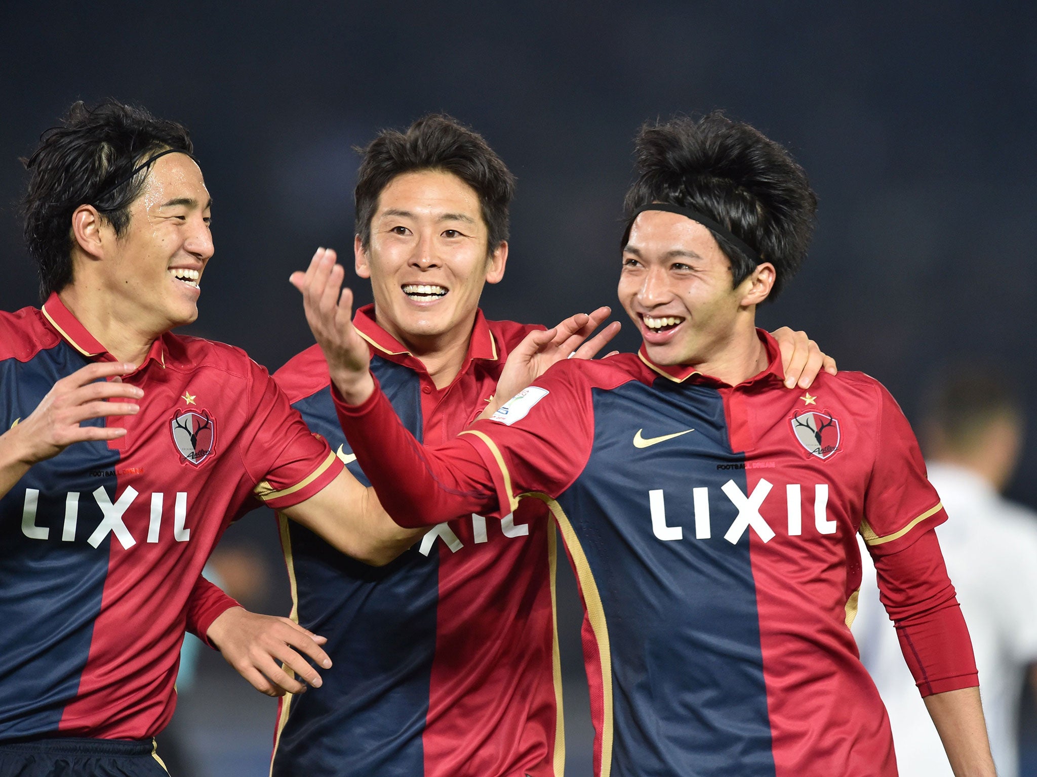 Gaku Shibasaki celebrates his second goal with team mates