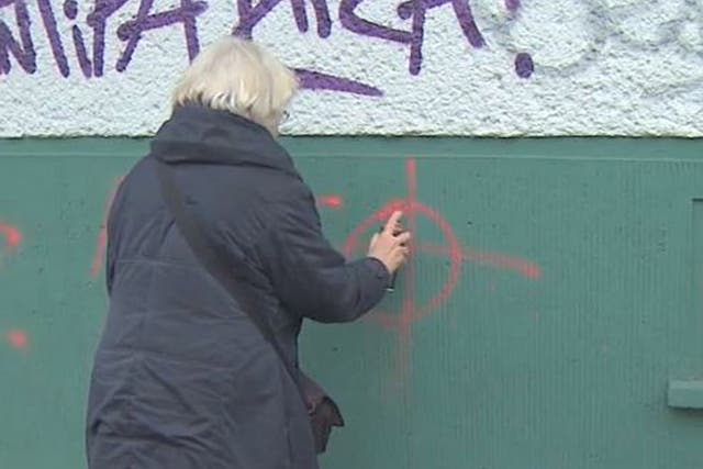 Irmela Schramm has been covering racist graffiti for the last thirty years