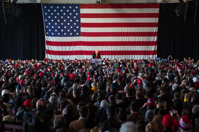 Donald Trump speaks in front of a capacity crowd at a rally for his campaign in Rochester, New York