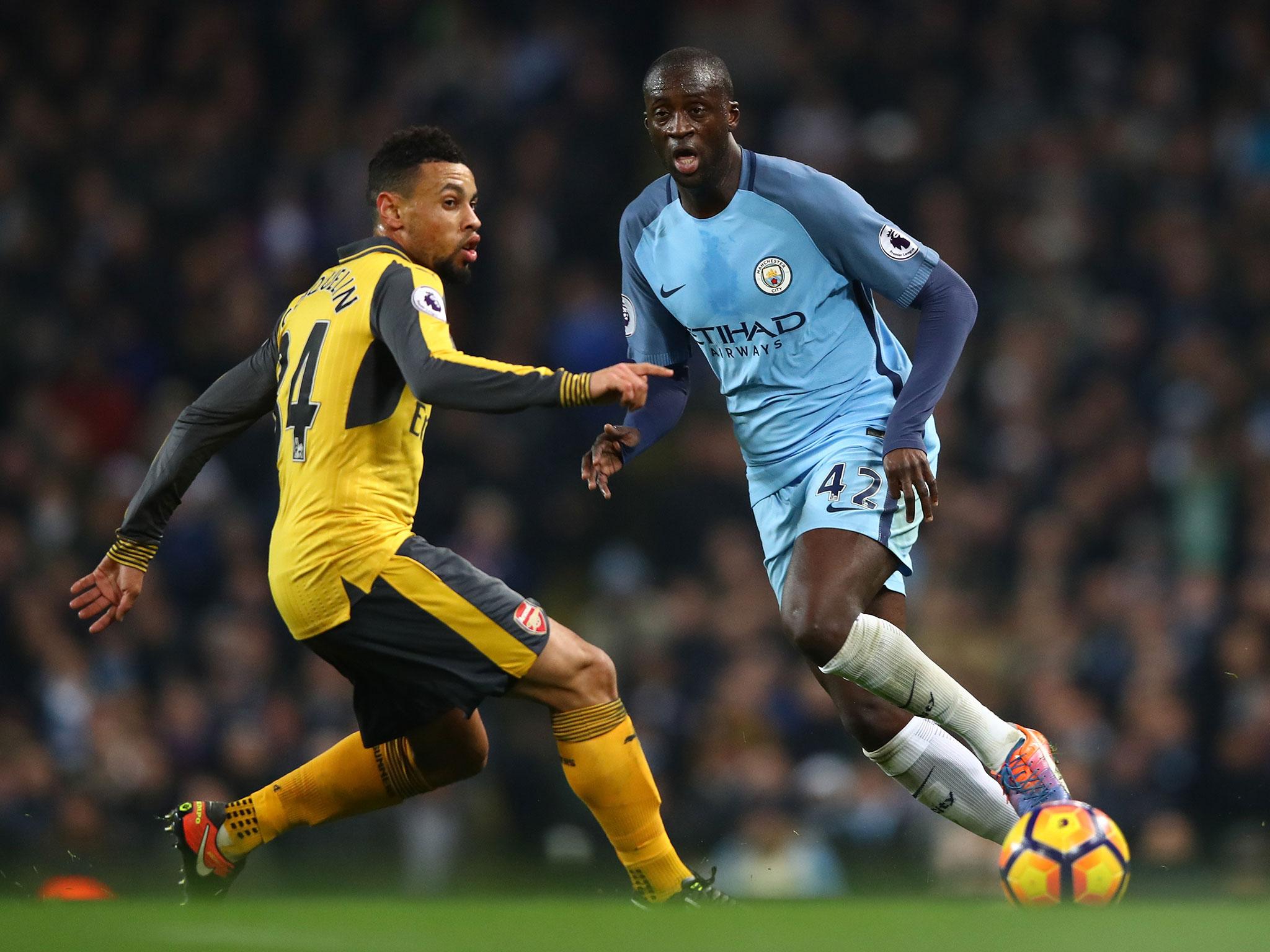 Toure in action against Arsenal