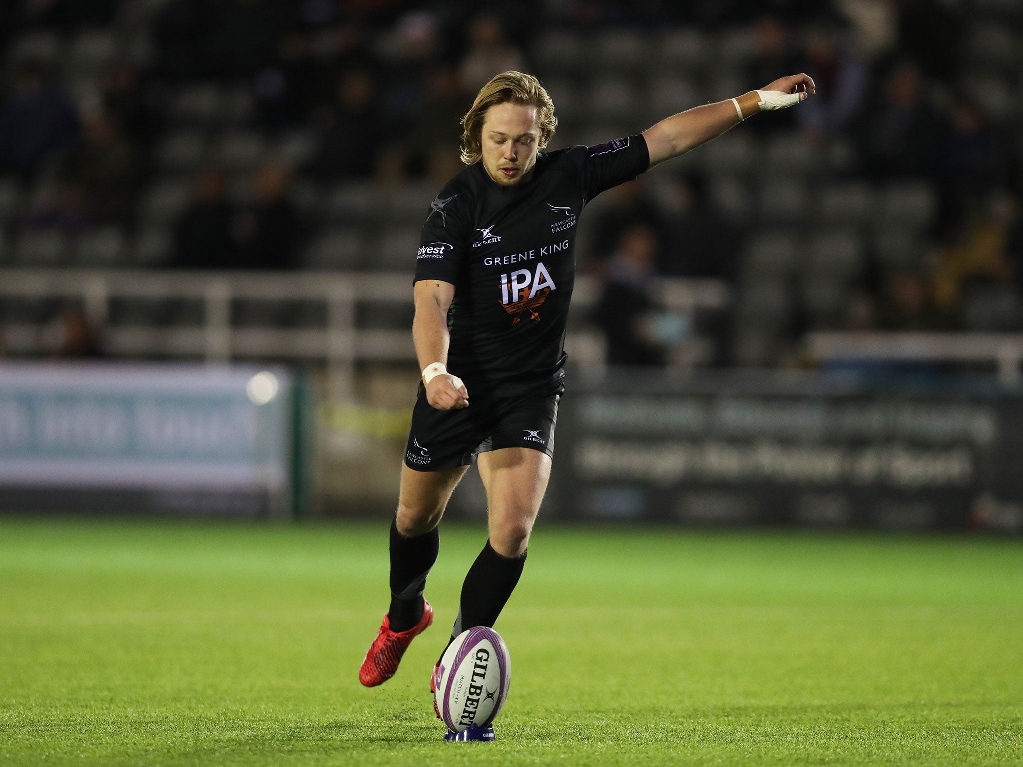 Joel Hodgson kicks a conversion for the Falcons