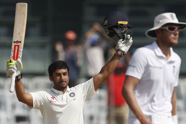 Karun Nair celebrates reaching his maiden Test century on day four against England